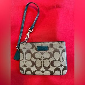 COACH Signature Logo Zippered Mini Canvas Wristlet with Teal Trim